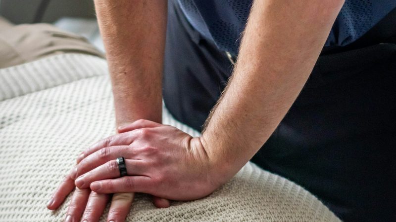 Therapist assessing a patient's range of motion